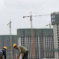 　　资料图。山西太原，民工在一建筑工地作业。中新社记者 武俊杰 摄 - 新浪上海