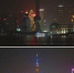 图为上海陆家嘴地区熄灯前(下)和熄灯后(上)的拼版照片。新华社记者丁汀摄 - 新浪上海
