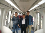 林国斌（中）与同事在长沙磁浮列车上） - 同济大学