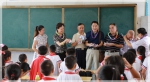 高菊兰巡视员回访上海军休干部希望小学并参加建校15周年庆祝活动 - 民政局